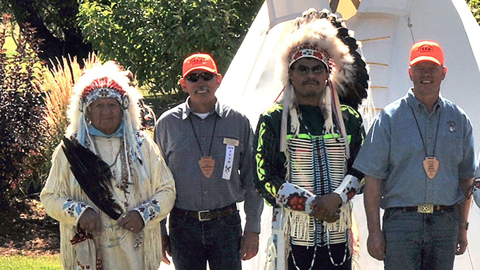 Willie LeClair, far left, served for many years as the medicine man for the One Shot Antelope Hunt. He's pictured here with former Gov. Matt Mead, right.