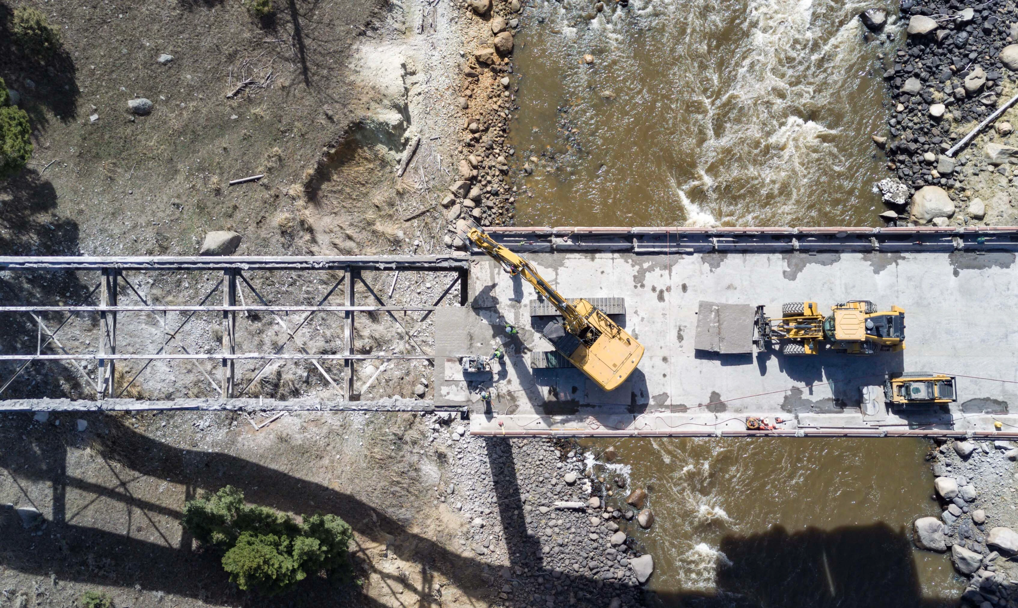 Now that the new 1,285-foot-long, 180-foot-tall Yellowstone Bridge is finished, demolition crews are dismantling the 65-year-old bridge that stood in its place. Tear-down is expected by end of year and the new bridge should last between 75-100 years.