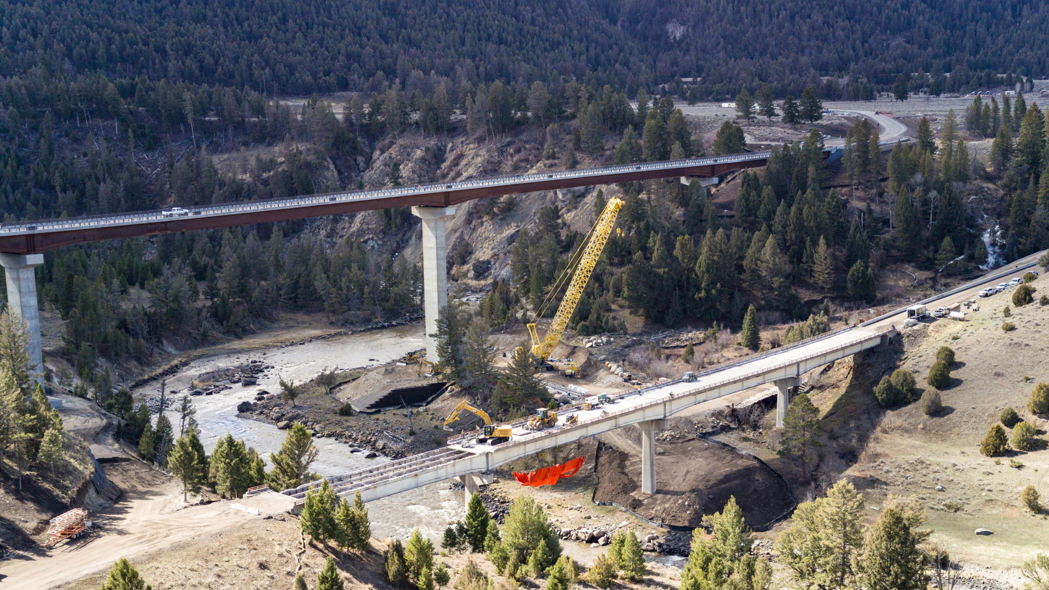 Now that the new 1,285-foot-long, 180-foot-tall Yellowstone Bridge is finished, demolition crews are dismantling the 65-year-old bridge that stood in its place. Tear-down is expected by end of year and the new bridge should last between 75-100 years.