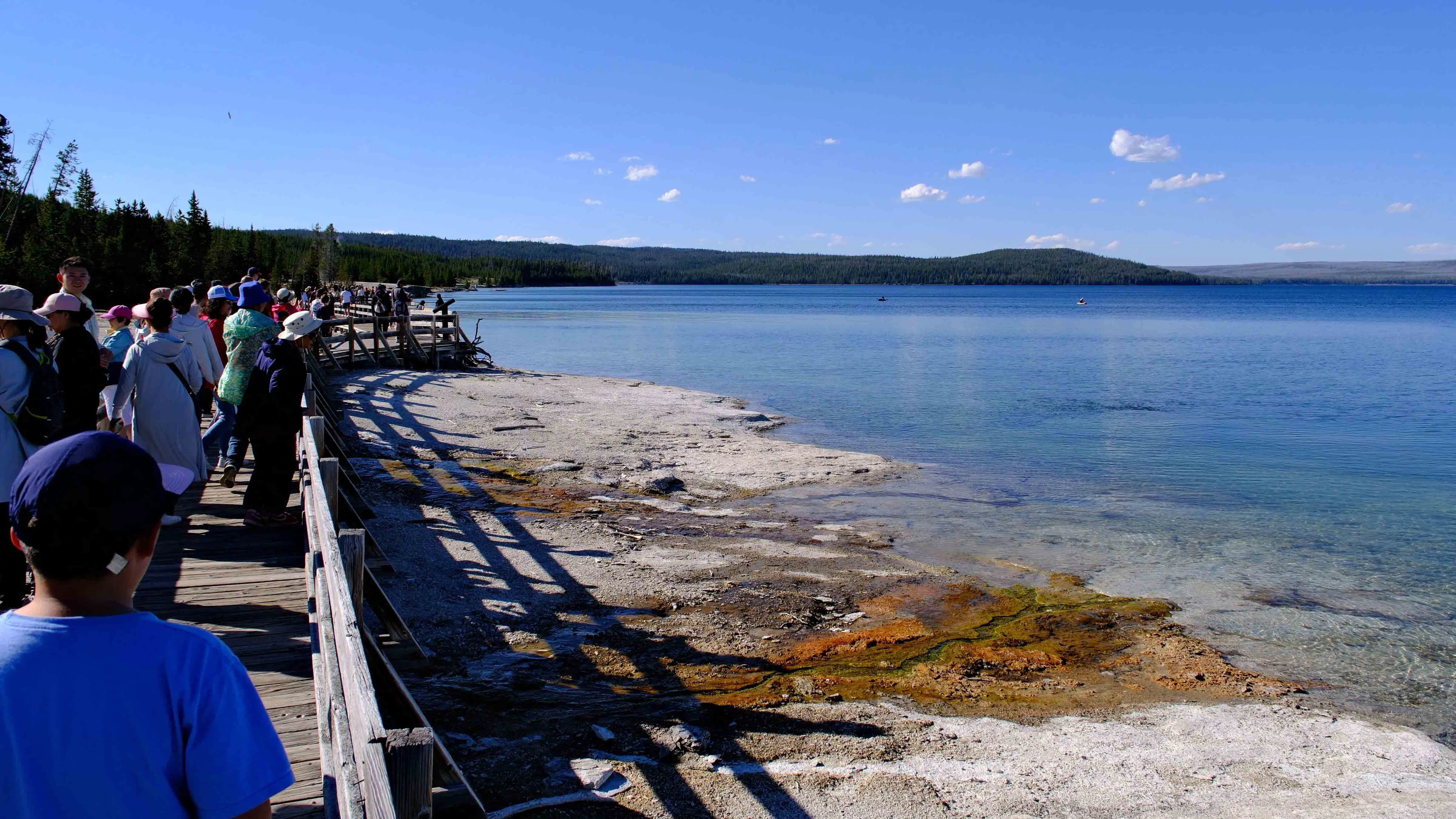 Tourists at Yellowstone Lake in Yellowstone National Park.
